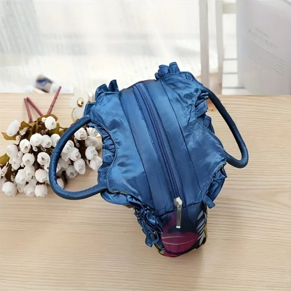 Elegant Blue Floral Lace Handbag with Tassel Accents NWT​​ - Picture 2 of 6